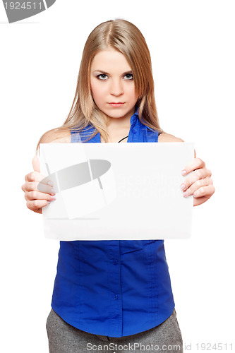 Image of Serious young blonde holding empty white board