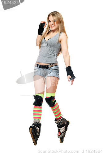 Image of Smiling young woman tries to keep his balance