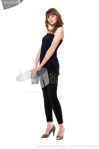 Image of Stylish girl in a black leggings. Isolated