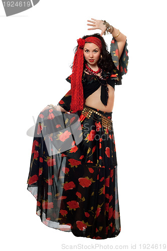 Image of Dancing gypsy woman in a black skirt