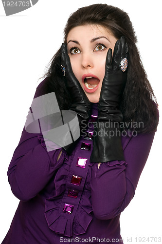 Image of Portrait of frightened young woman. Isolated on white