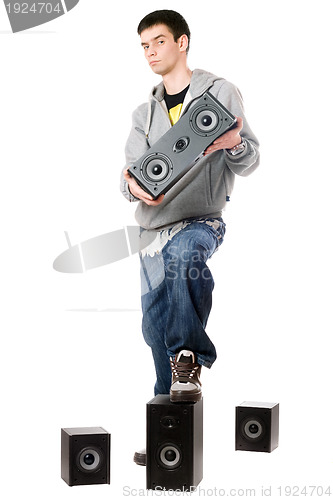 Image of Young man with a four speakers