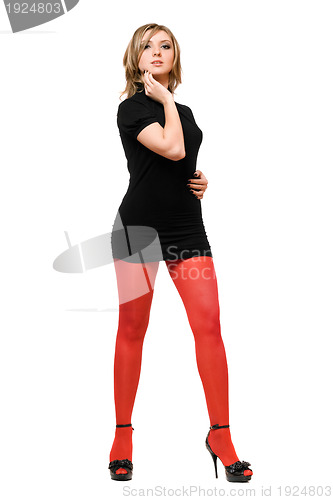 Image of Attractive young woman in a black dress