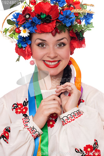 Image of smiling woman in the Ukrainian national clothes