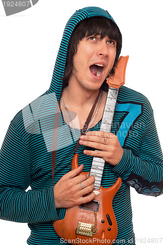 Image of Crazy young man with a little guitar