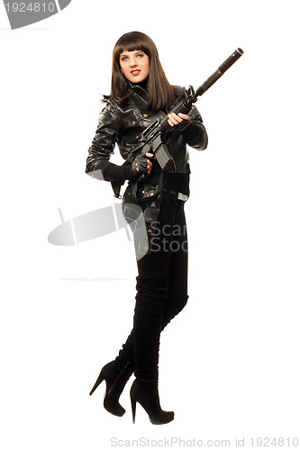 Image of Female in black with gun