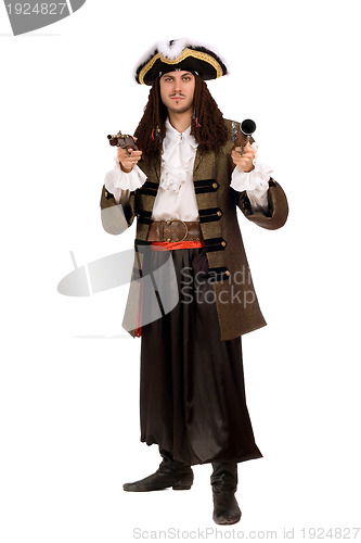 Image of Young man in a pirate costume with pistol