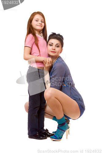 Image of Happy young mother and little daughter. Isolated