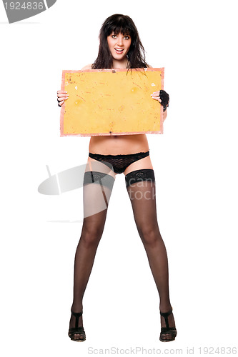 Image of young brunette taking vintage yellow board