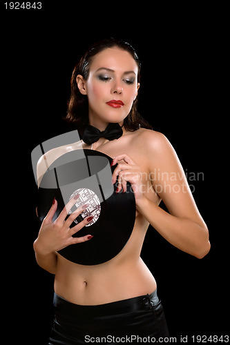 Image of Sexy young woman topless with vinyl