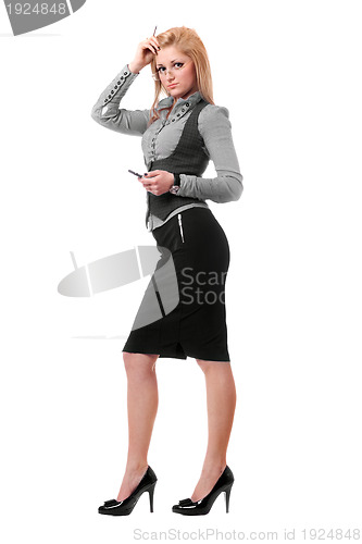 Image of Attractive young blonde with smartphone. Isolated