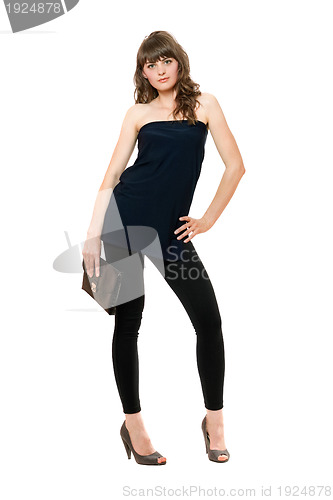 Image of Pretty young woman in black leggings