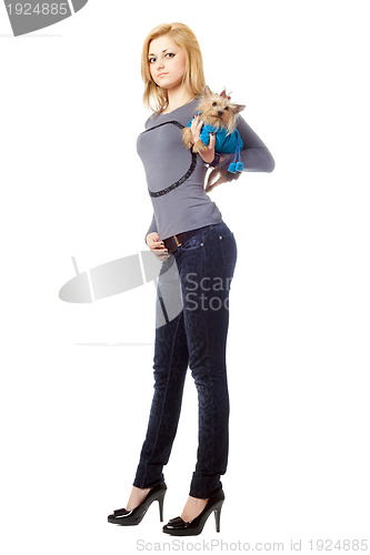 Image of Attractive blonde posing with puppy. Isolated