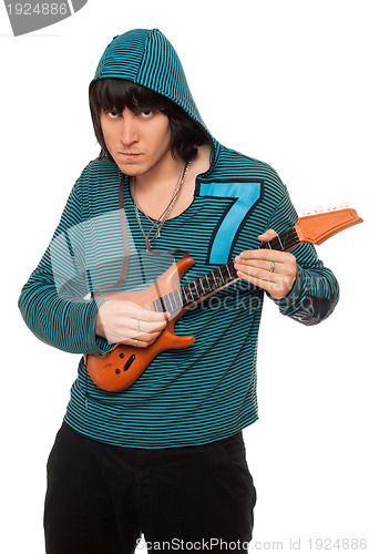 Image of young man with a little guitar