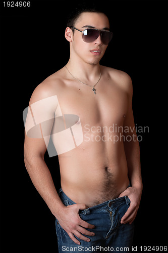 Image of Portrait of handsome young man in sanglasses
