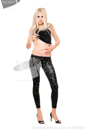 Image of Seductive young blonde in black leggings