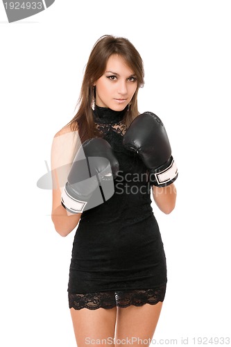 Image of Pretty brunette woman in boxing gloves