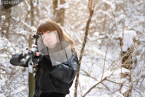 Image of Girl aiming a gun