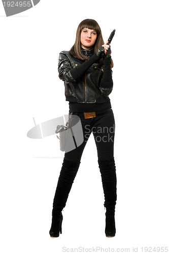 Image of Beautiful armed girl in black