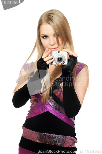 Image of Young pretty blonde holding a photo camera. Isolated