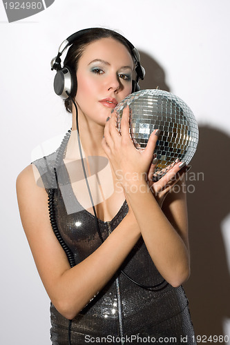 Image of Portrait of young woman in headphones