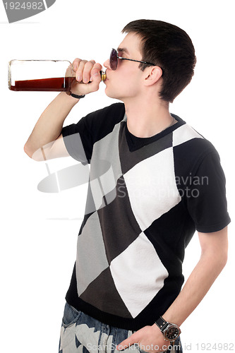 Image of Young man with a bottle