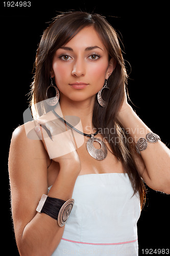 Image of Portrait of a lovely young brunette. Isolated