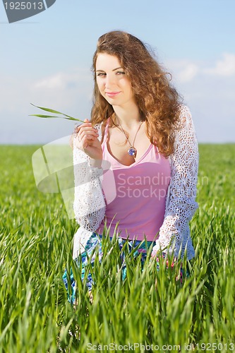 Image of Portrait of smiling nice young woman