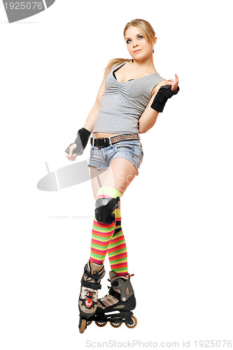 Image of Beautiful young blonde on roller skates