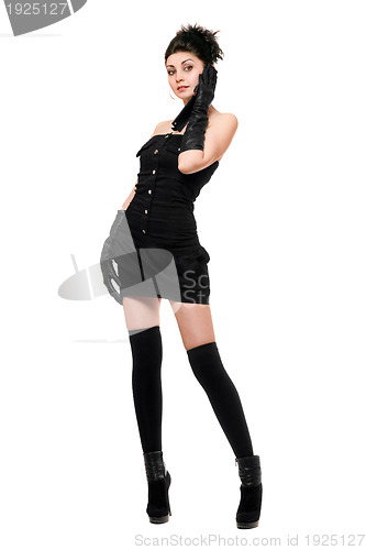 Image of Pretty young woman in a black dress