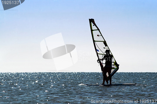 Image of Silhouette of a windsurfer