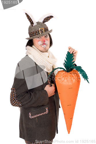 Image of young man dressed in a suit rabbit