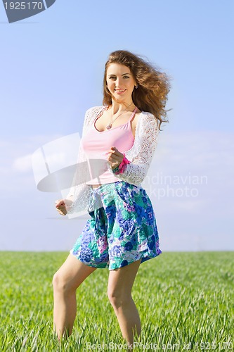 Image of Playful pretty young woman