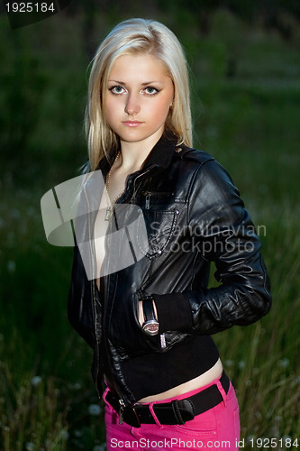 Image of blonde in a black leather jacket