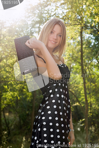 Image of Portrait of a smiling young blonde