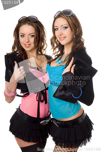 Image of Portrait of two playful attractive young women