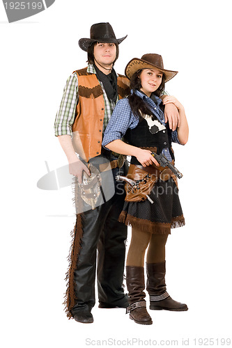 Image of Young cowboy and cowgirl