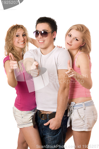 Image of two smiling sexy women and handsome young man