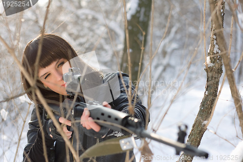 Image of girl with a sniper rifle