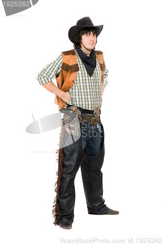 Image of Young man dressed as cowboy. Isolated