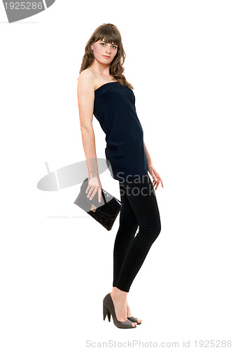 Image of Lovely girl in black leggings with a handbag