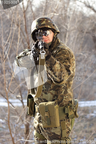 Image of Portrait of soldier with a gun