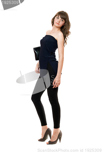 Image of Pretty girl in a black leggings. Isolated