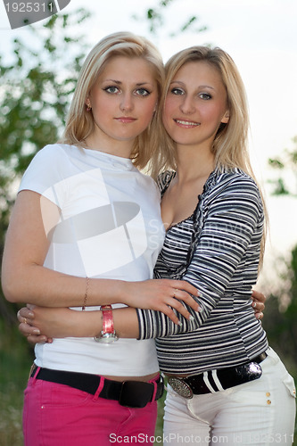 Image of Portrait of two smiling beautiful young women