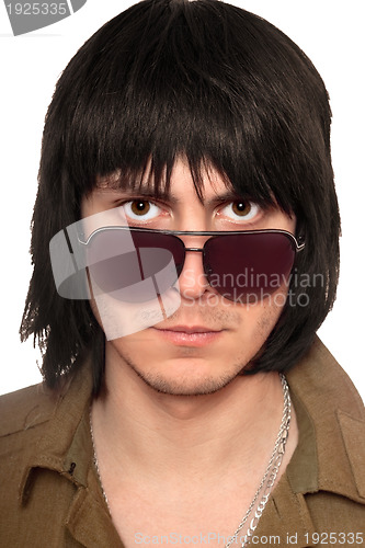 Image of Portrait of young man in sunglasses