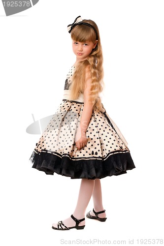 Image of Attractive little girl in a dress