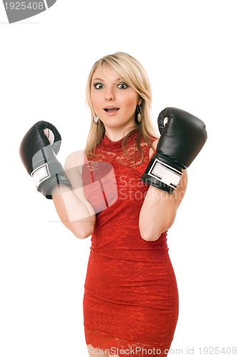 Image of Charming blond girl in boxing gloves