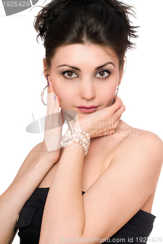 Image of Portrait of pretty young woman in a black dress