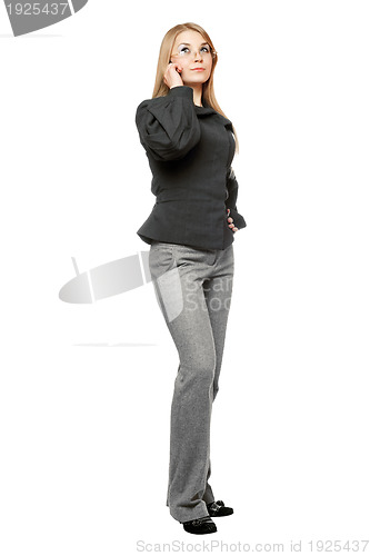 Image of Serious young woman in a gray business suit