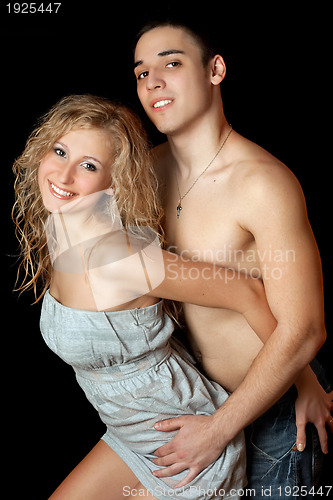 Image of Portrait of cheerful beautiful young couple. Isolated